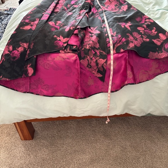 High/low black top with black and pink patterned skirt attached. - Picture 2 of 9